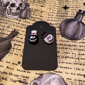 Black and white pumpkin head earrings